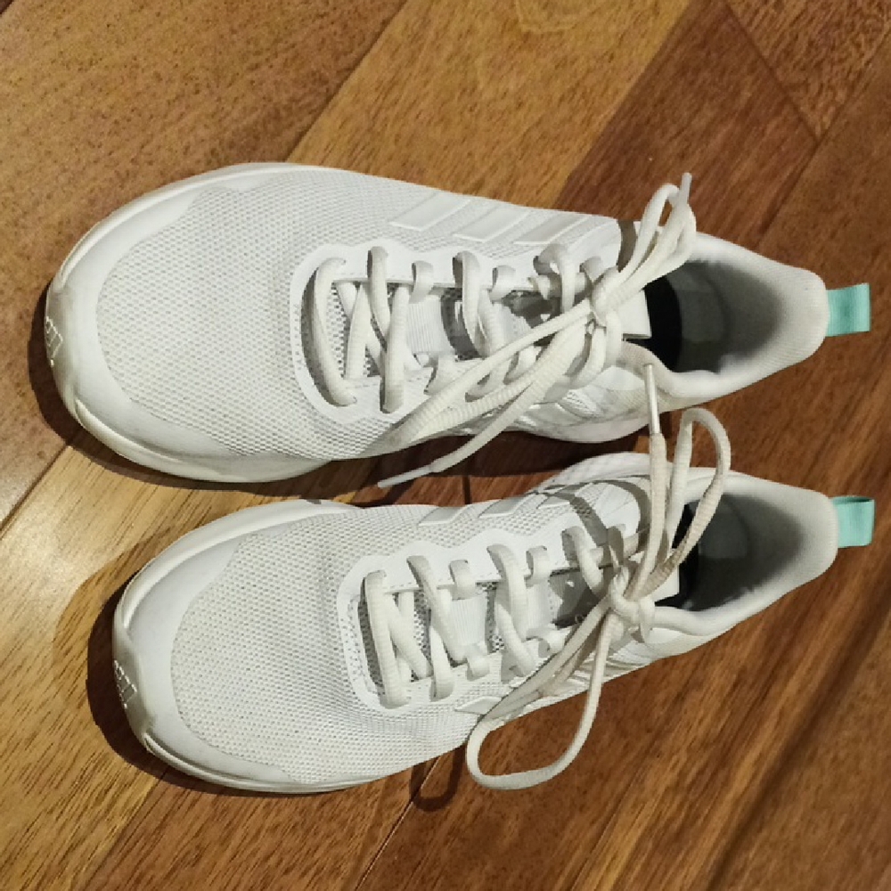 Only worn twice - Adidas White Athletic Shoes Sleek Design Breathable Comfort.